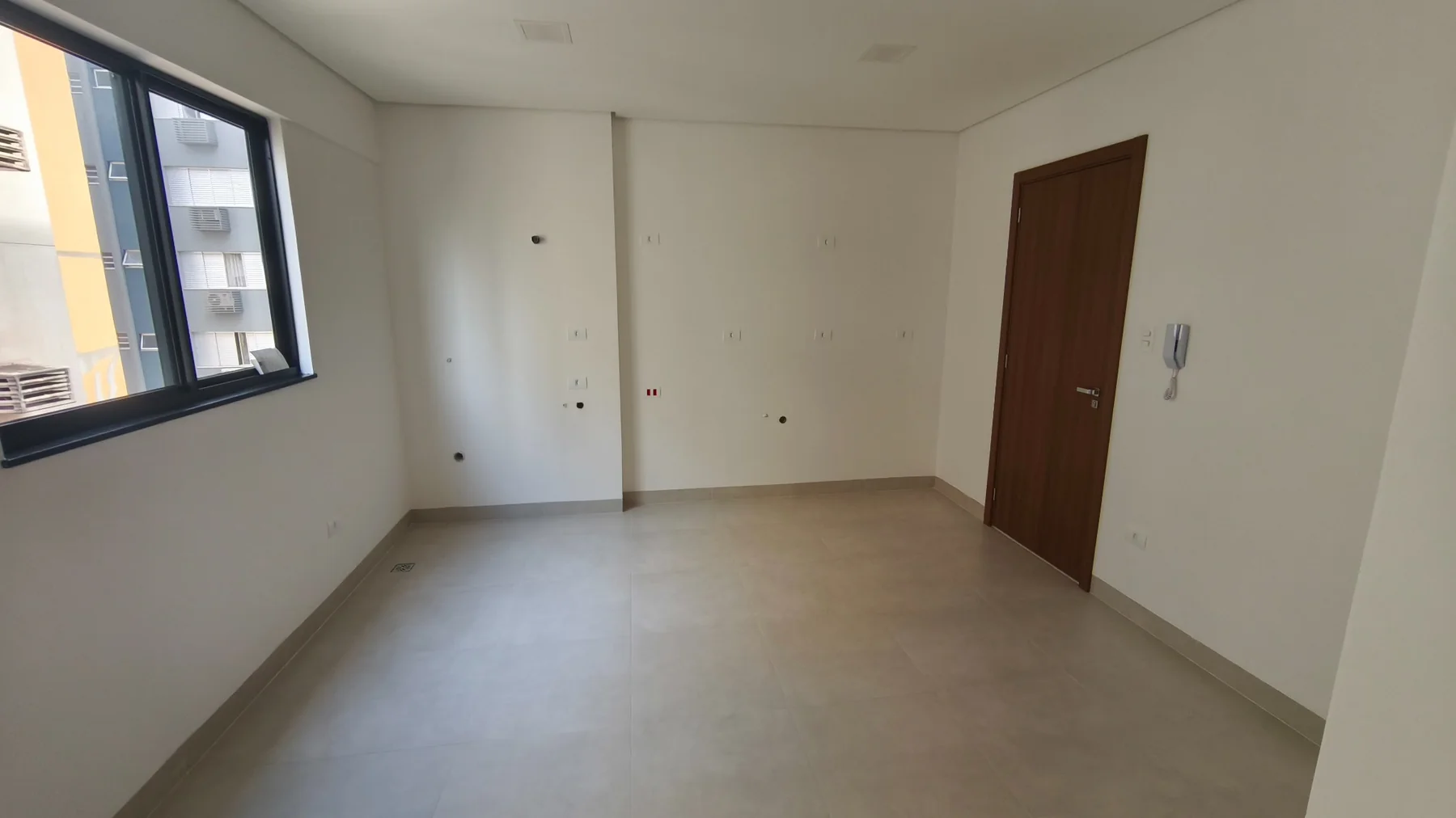 Foto real da área destinada à cozinha no studio